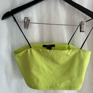 neon green forever 21 tube top with black spaghetti straps! will iron before